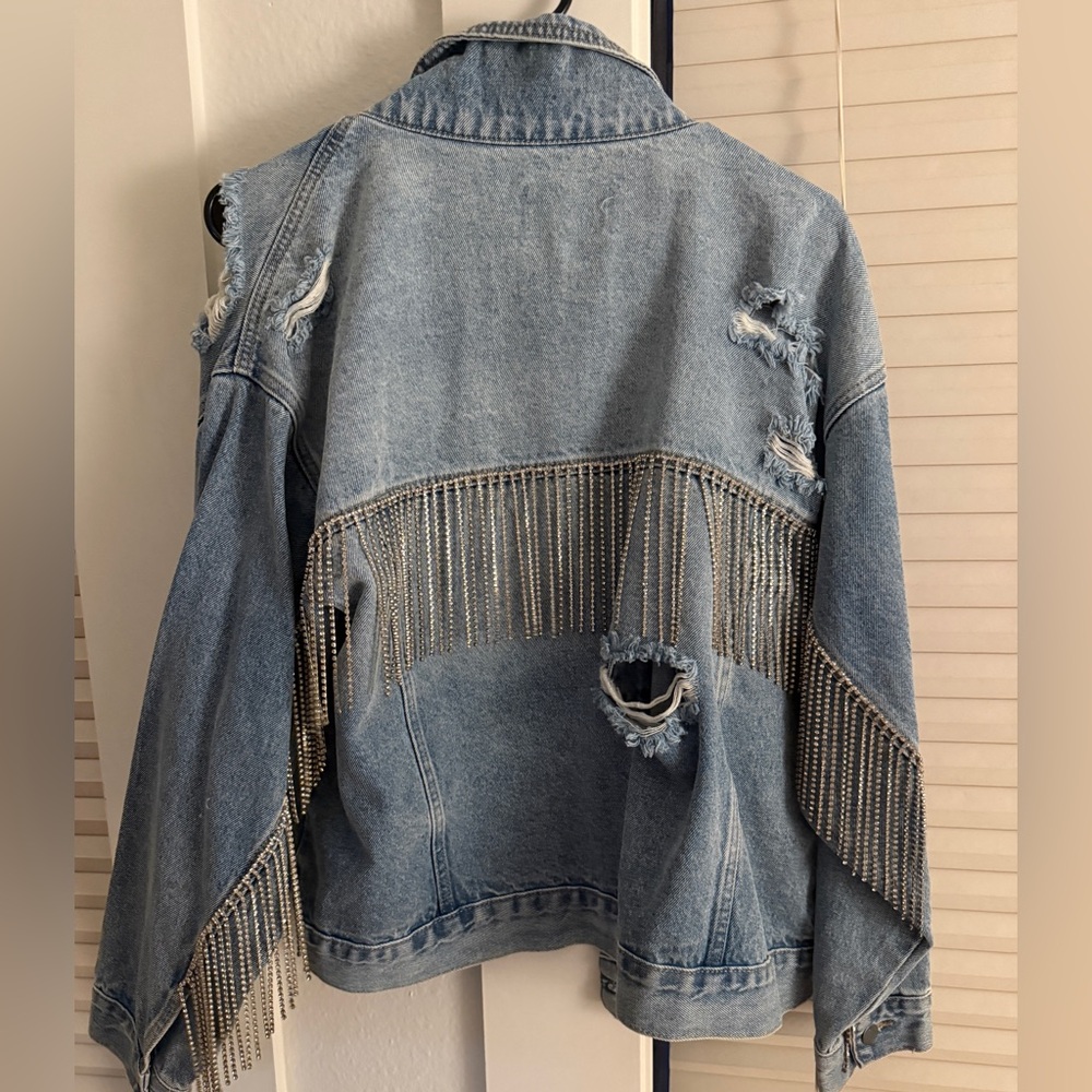 Distressed Denim Jacket with Fringe